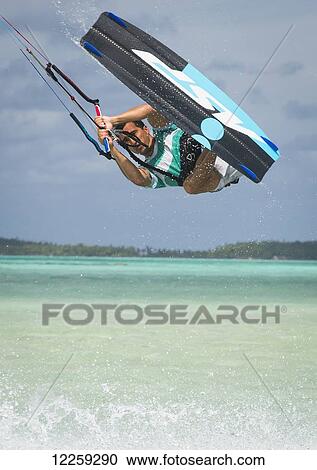 Stock Image - Windsurfing; Vavau, Tonga. Fotosearch