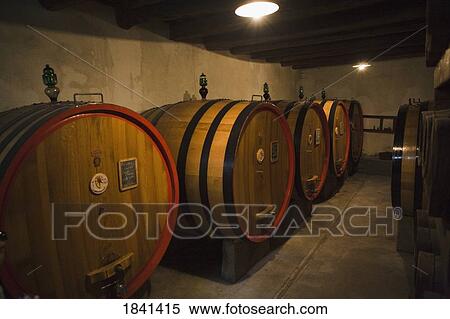 Wine Barrels In Cellar; Castello Di Verrazzano, Greti, Italy View Large Photo Image Stock Photography - Wine Barrels In Cellar; Castello Di Verrazzano, Greti, Italy. Fotosearch