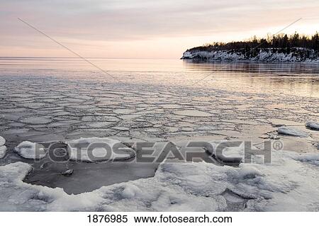 Winter Along The Shore Of Lake Superior At Sunrise; Minnesota, Usa View Large Photo Image Stock Photography - Winter Along The Shore Of Lake Superior At Sunrise; Minnesota, Usa. Fotosearch