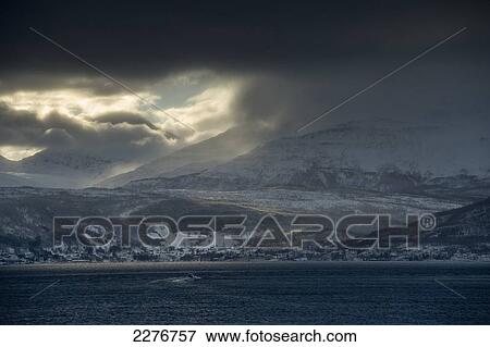Stock Photo - Winter landscape view from onboard the Hurtigruten ship MS Nordlys; Norway. Fotosearch