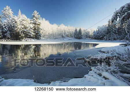 Winter landscape with ice on a lake; Ontario, Canada View Large Photo Image Stock Image - Winter landscape with ice on a lake; Ontario, Canada. Fotosearch