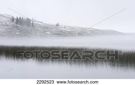 Winter over elkwater lake in cypress hills provincial park; Alberta canada View Large Photo Image Stock Image - Winter over elkwater lake in cypress hills provincial park; Alberta canada. Fotosearch