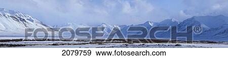 Stock Photo - Winter Scene Of The Tombstone Mountains Along The Dempster Highway, Yukon.. Fotosearch