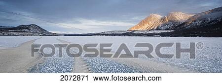 Winter Scene On Frozen Kusawa Lake, Kusawa Lake Territorial Park, Yukon Territory, Canada View Large Photo Image Stock Image - Winter Scene On Frozen Kusawa Lake, Kusawa Lake Territorial Park, Yukon Territory, Canada. Fotosearch