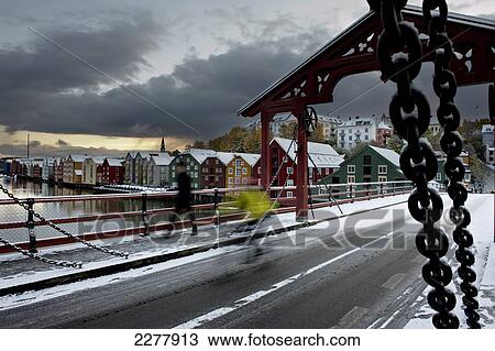 Stock Image - Winter snow view over Old Town Bridge, over the river Nidelva; Trondheim, Norway. Fotosearch