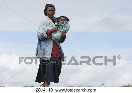 Woman And Baby Antananarivo, Madagascar View Large Photo Image Stock Image - Woman And Baby Antananarivo, Madagascar. Fotosearch