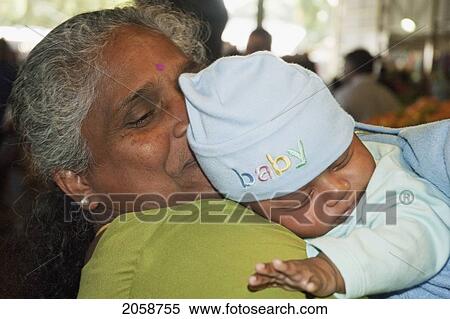Woman And Baby At The Market, Curepipe, Mauritius View Large Photo Image Stock Photography - Woman And Baby At The Market, Curepipe, Mauritius. Fotosearch