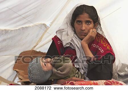 Woman And Baby In A Relief Camp Tent After The 8 October 2005 Earthquake, Bagh, Azad Kashmir, Pakistan View Large Photo Image Stock Image - Woman And Baby In A Relief Camp Tent After The 8 October 2005 Earthquake, Bagh, Azad Kashmir, Pakistan. Fotosearch