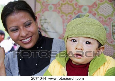 Woman And Boy At The Alasitas Fair, La Paz, Bolivia View Large Photo Image Picture - Woman And Boy At The Alasitas Fair, La Paz, Bolivia. Fotosearch