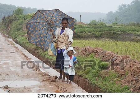 Stock Image - Woman And Girl, Ranomafana, Fianarantsoa Province, Madagascar. Fotosearch