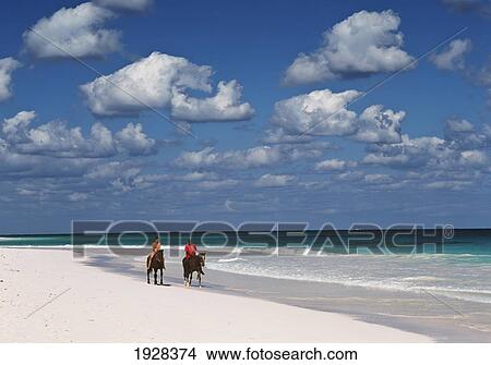 Picture - Woman And Local Guide Going On Horses. Fotosearch