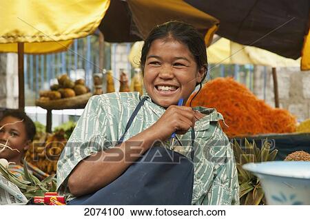 Woman At An Antananarivo Market, Antananarivo Province, Madagascar View Large Photo Image Stock Image - Woman At An Antananarivo Market, Antananarivo Province, Madagascar. Fotosearch