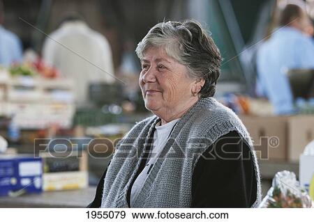 Woman At The Kosevo Market, Sarajevo, Bosnia And Herzegovina View Large Photo Image Stock Photo - Woman At The Kosevo Market, Sarajevo, Bosnia And Herzegovina. Fotosearch