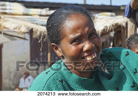 Woman At The Weekly Market In Fianarantsoa, Madagascar View Large Photo Image Stock Image - Woman At The Weekly Market In Fianarantsoa, Madagascar. Fotosearch
