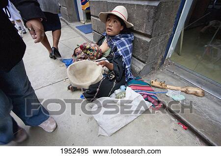 Woman begging on a street, Cochabamba, Bolivia View Large Photo Image Stock Photography - Woman begging on a street, Cochabamba, Bolivia. Fotosearch