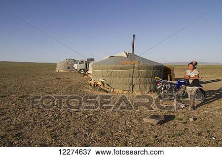 Woman by a Mongolian ger (yurt), Gobi Gurvansaikhan National Park,? mn÷govi Province, Mongolia View Large Photo Image Stock Photo - Woman by a Mongolian ger (yurt), Gobi Gurvansaikhan National Park,? mn÷govi Province, Mongolia. Fotosearch