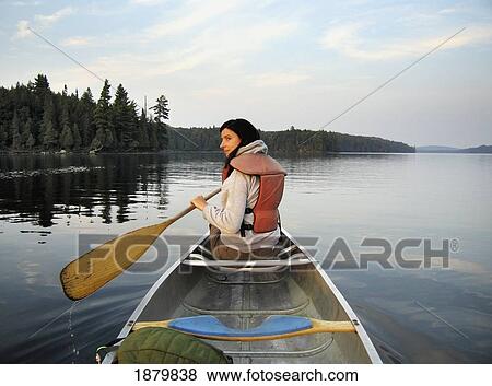 Woman Canoeing On A Lake View Large Photo Image Stock Photo - Woman Canoeing On A Lake. Fotosearch