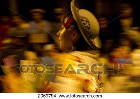 Woman Dancing In The Gran Entrada De Comadres Parade During The Carnaval Chapaco At Night, Tarija, Bolivia View Large Photo Image Picture - Woman Dancing In The Gran Entrada De Comadres Parade During The Carnaval Chapaco At Night, Tarija, Bolivia. Fotosearch