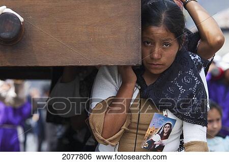 Woman Dressed In Mourning Helps Carry The Anda (Float) Of The Sorrowful Virgin Mary During A Good Friday Procession In Antigua Guatemala, Sacatep View Large Photo Image Stock Photograph - Woman Dressed In Mourning Helps Carry The Anda (Float) Of The Sorrowful Virgin Mary During A Good Friday Procession In Antigua Guatemala, Sacatep. Fotosearch