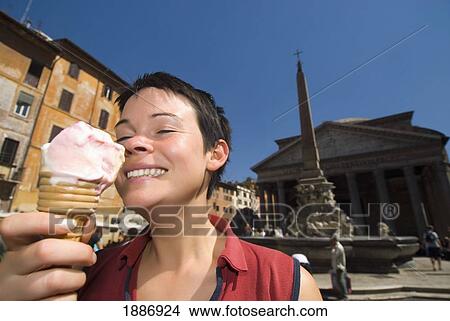 Woman Eating Ice Cream In Front Of The Pantheon View Large Photo Image Picture - Woman Eating Ice Cream In Front Of The Pantheon. Fotosearch