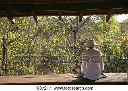 Woman Enjoying View Onto National Park. View Large Photo Image Stock Photo - Woman Enjoying View Onto National Park.. Fotosearch