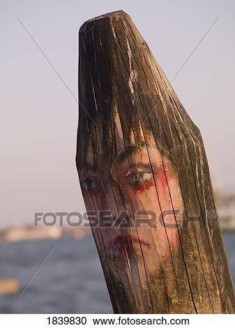 Woman Face Painted On Sharpened Pole; Venice, Italy View Large Photo Image Stock Image - Woman Face Painted On Sharpened Pole; Venice, Italy. Fotosearch