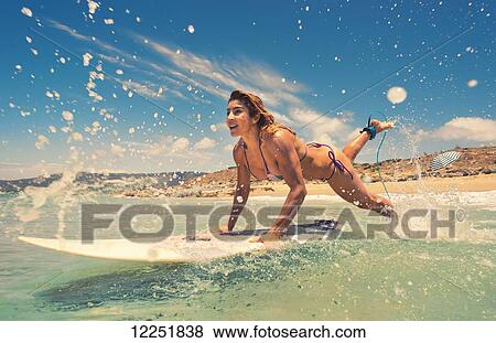 Stock Photo - Woman having fun at the beach; Bolonia, Tarifa, Costa de la Luz, Andalusia, Spain. Fotosearch