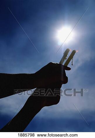 Stock Photo - Woman Holding Candles As Offerings, Fatima. Fotosearch