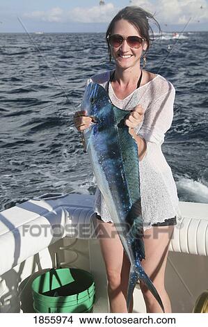 Woman Holding Newly Caught Fish, Cabo San Lucas, Mexico View Large Photo Image Picture - Woman Holding Newly Caught Fish, Cabo San Lucas, Mexico. Fotosearch