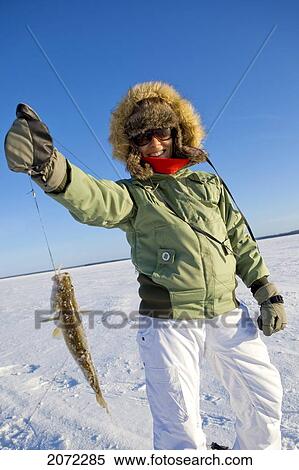 Woman Ice Fishing, Preissac Lake, Quebec View Large Photo Image Stock Photography - Woman Ice Fishing, Preissac Lake, Quebec. Fotosearch