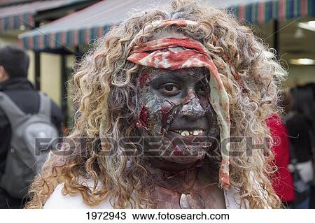Stock Image - Woman In A Gruesome Costume At The Toronto Zombie Walk, Toronto, Ontario, Canada. Fotosearch