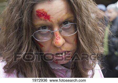 Woman In A Gruesome Costume At The Toronto Zombie Walk, Toronto, Ontario, Canada View Large Photo Image Stock Photograph - Woman In A Gruesome Costume At The Toronto Zombie Walk, Toronto, Ontario, Canada. Fotosearch