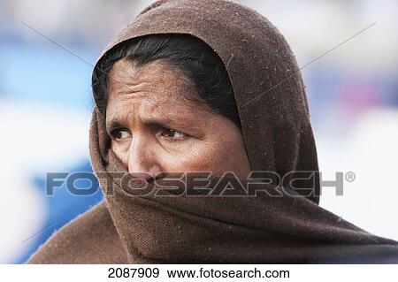 Stock Photo - Woman In A Relief Camp After The 8 October 2005 Earthquake, Muzaffarabad, Azad Kashmir, Pakistan. Fotosearch