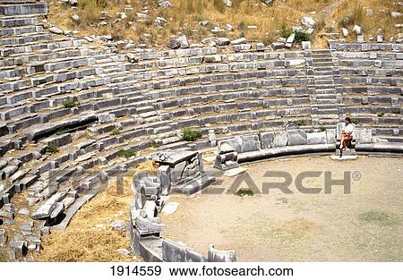Stock Photo - Woman In Amphitheatre. Fotosearch