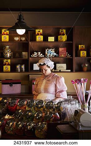 Woman in candy shop in Avonlea Village of Anne of Green Gables; Cavendish, Prince Edward Island, Canada View Large Photo Image Stock Photo - Woman in candy shop in Avonlea Village of Anne of Green Gables; Cavendish, Prince Edward Island, Canada. Fotosearch