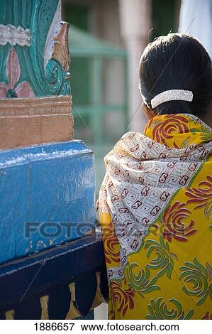 Woman In Colourful Sari Leaning Against Wall View Large Photo Image Stock Photo - Woman In Colourful Sari Leaning Against Wall. Fotosearch