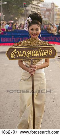 Stock Photo - Woman In Flower Festival, Chiang Mai, Thailand. Fotosearch