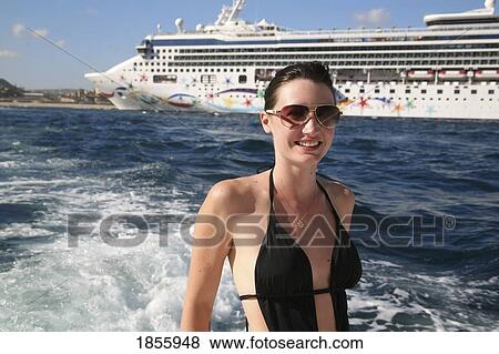 Woman In Front Of Cruise Ship, Cabo San Lucas, Mexico View Large Photo Image Stock Photo - Woman In Front Of Cruise Ship, Cabo San Lucas, Mexico. Fotosearch