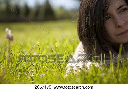 Woman In Grass. Langley Bc View Large Photo Image Stock Image - Woman In Grass. Langley Bc. Fotosearch