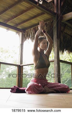 Woman In Lotus Position Sitting On Floor Of An Eco-Lodge View Large Photo Image Stock Photography - Woman In Lotus Position Sitting On Floor Of An Eco-Lodge. Fotosearch