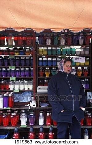 Stock Image - Woman In Market Selling Candles; Ljubljana, Slovenia. Fotosearch