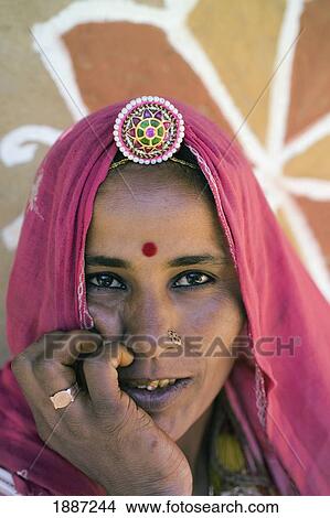 Picture - Woman In Pink Sari, Close Up. Fotosearch
