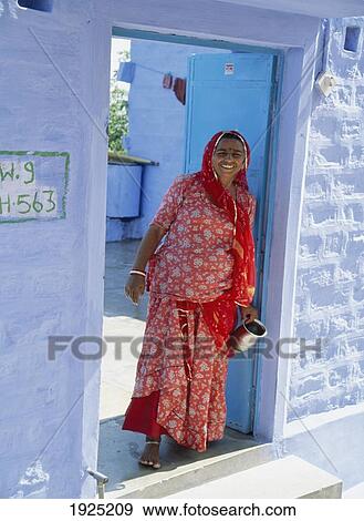 Stock Photo - Woman In The Blue City. Fotosearch