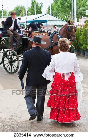 Woman In Traditional Seville Clothing At April Fearia Festival; Seville, Andalucia, Spain, Europe View Large Photo Image Picture - Woman In Traditional Seville Clothing At April Fearia Festival; Seville, Andalucia, Spain, Europe. Fotosearch