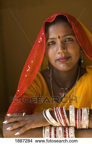 Woman In Yellow Sari With Bangles View Large Photo Image Picture - Woman In Yellow Sari With Bangles. Fotosearch