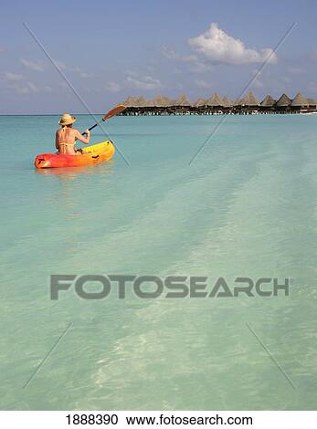 Woman Kayaking In Clear Water. View Large Photo Image Stock Image - Woman Kayaking In Clear Water.. Fotosearch