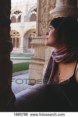Woman Looking At Courtyard At Monesteiro Dos Jeronimos View Large Photo Image Stock Photograph - Woman Looking At Courtyard At Monesteiro Dos Jeronimos. Fotosearch