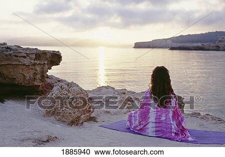 Woman Looking Out Across Sea From Beach View Large Photo Image Stock Image - Woman Looking Out Across Sea From Beach. Fotosearch