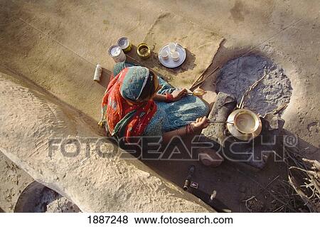 Woman Making Chai Outdoors View Large Photo Image Stock Photo - Woman Making Chai Outdoors. Fotosearch