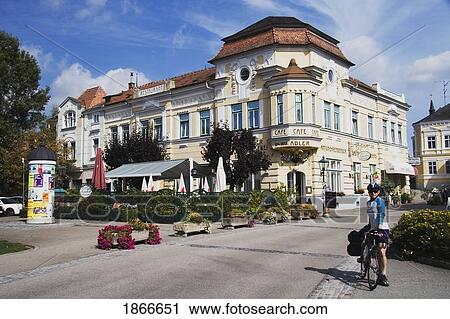 Woman On A Bike On A Street; Austria View Large Photo Image Stock Image - Woman On A Bike On A Street; Austria. Fotosearch